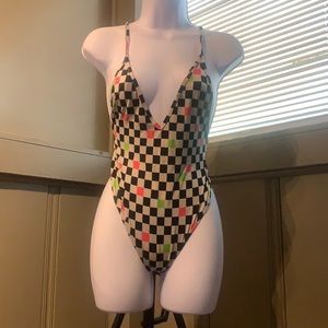 Nice fitted multi colored checkered leotard.
